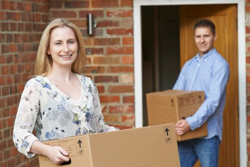Trained movers handling belongings carefully in Battersea