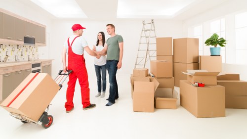 Commercial movers handling office equipment in Battersea business district