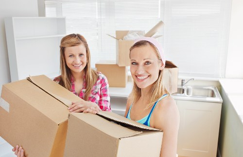 Local Battersea moving team handling furniture and boxes