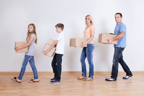 Loading furniture into a removals van for a Battersea property move